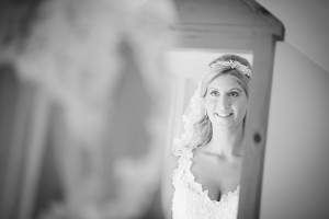 Bride Looking in Mirror