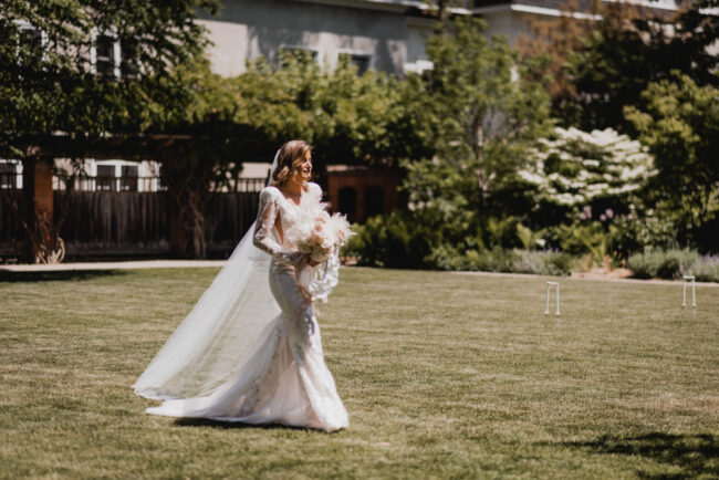 bride approaching groom during first look