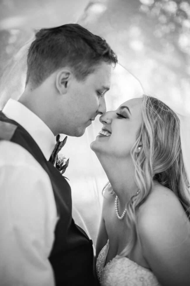 bride and groom veil photos