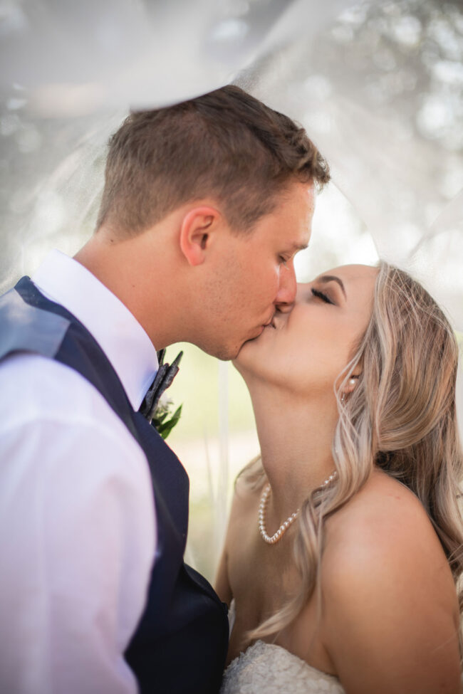 bride and groom veil photos