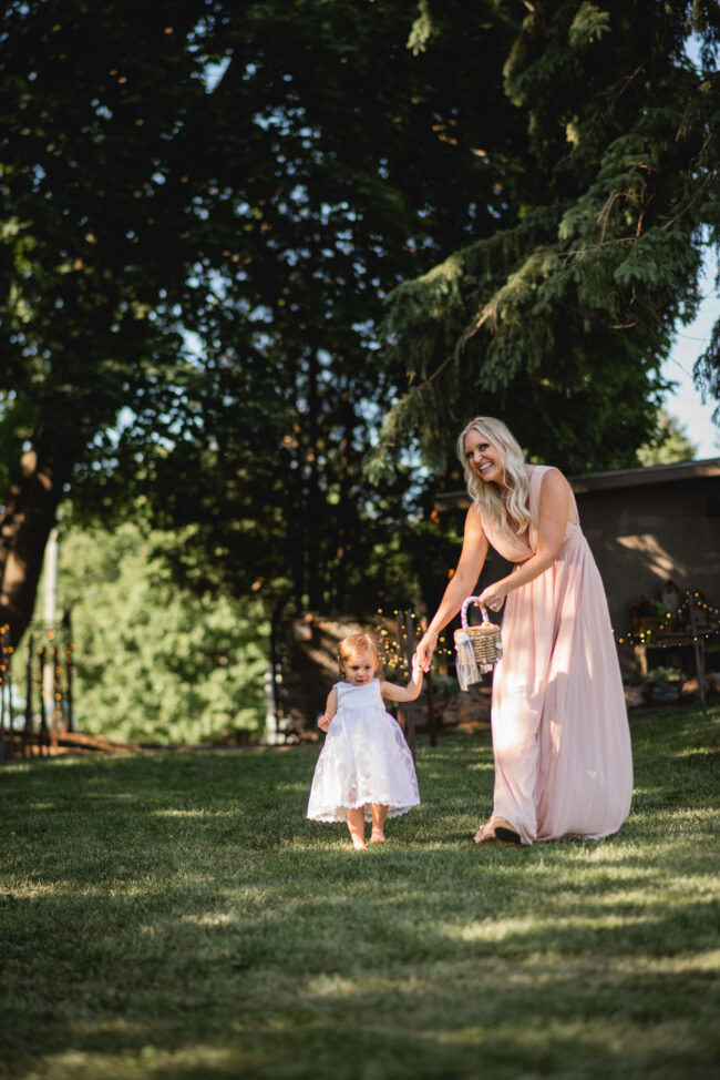 flower girl walking down aisle