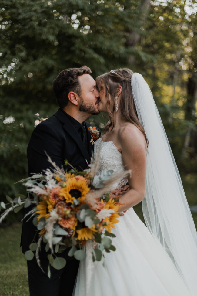 bride and groom kissing