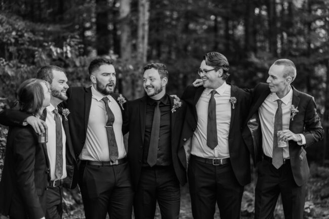 groom and groomsmen laughing
