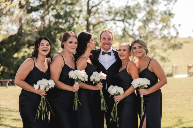 groom with bridesmaids
