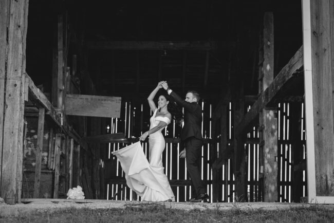 bride and groom portraits in barn