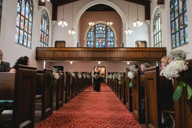 maid of honour walking down aisle