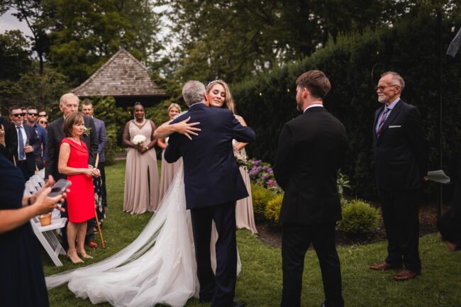 dad giving bride away at wedding ceremony toronto