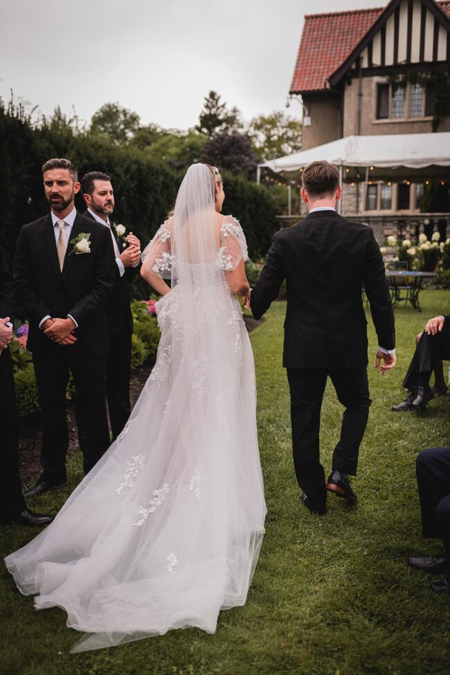 bride and groom signing wedding register toronto