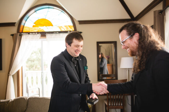 groom and groomsmen getting ready