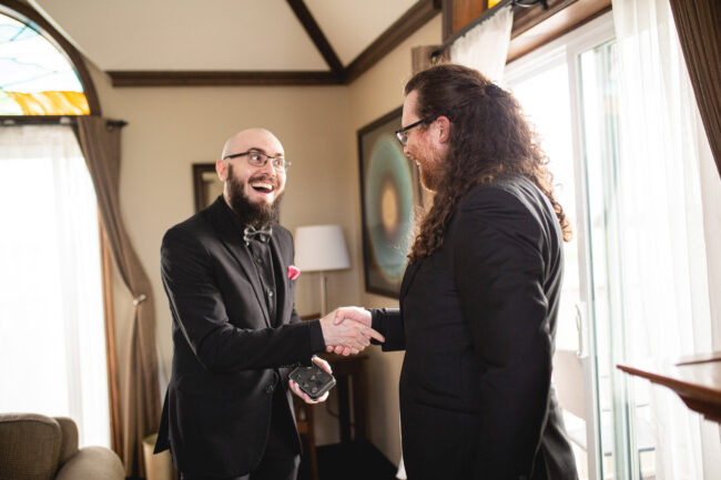 groom and groomsmen getting ready