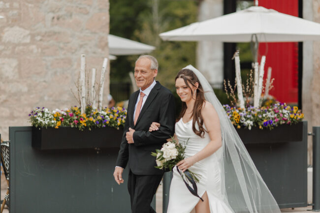 tapestry hall outdoor wedding ceremony