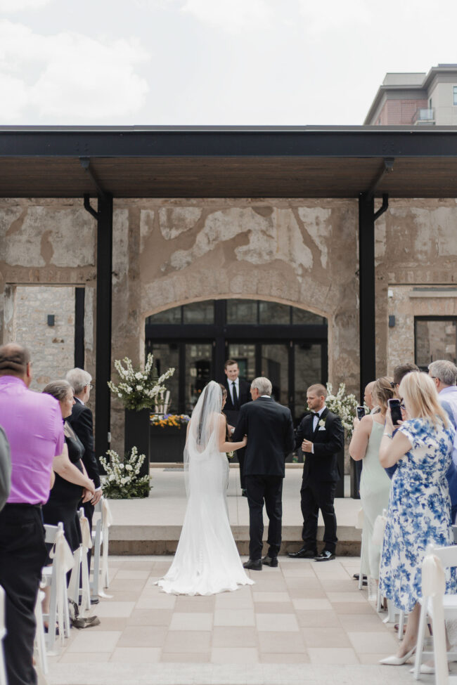 tapestry hall outdoor wedding ceremony