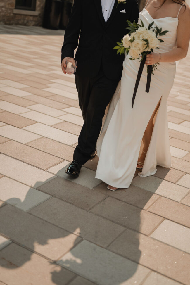 bride and groom on wedding day tapestry hall